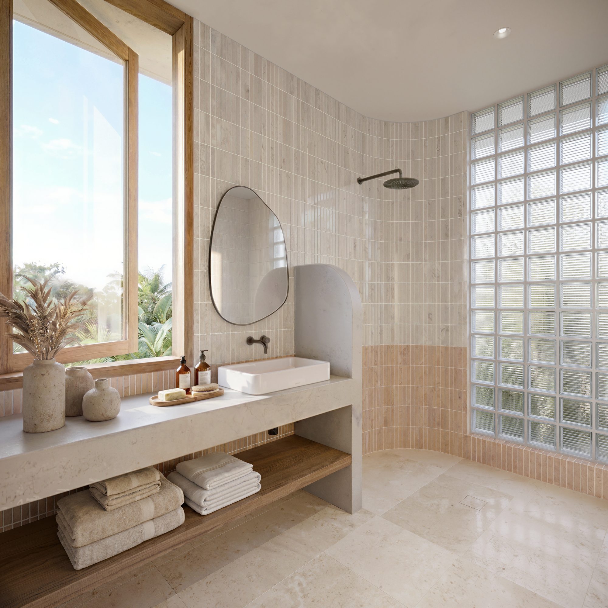 Beige kit-kat tile bathroom with pebble mirror and blush tile accent